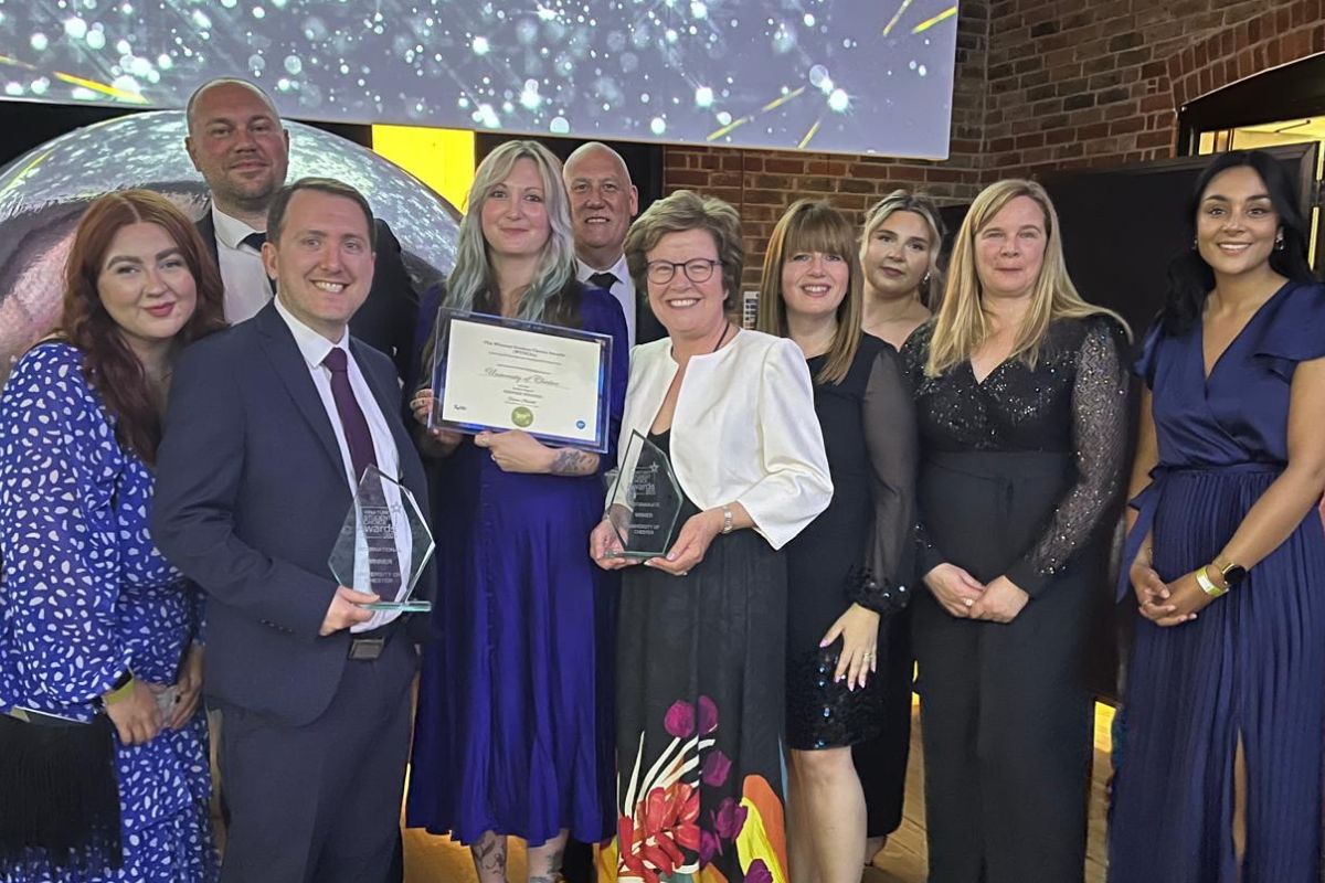 The University of Chester team holding on to the three awards.